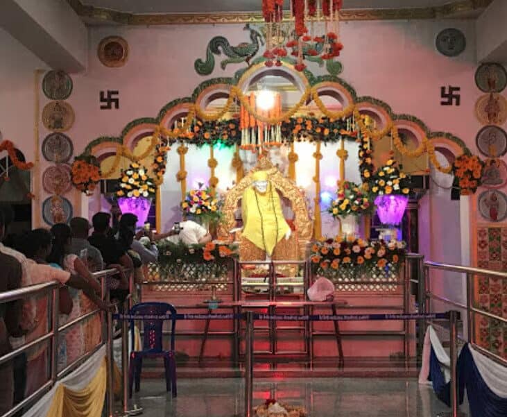 Vibrant Hanuman temple in Bangalore with colorful decorations, offering prayers and rituals to Lord Hanuman.