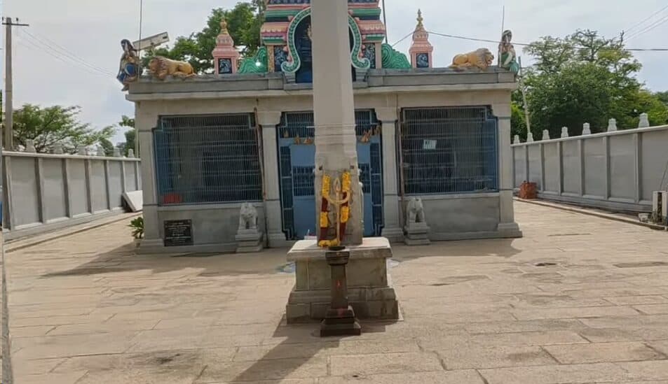 Ancient Hanuman temple with colorful sculptures and serene environment in Bangalore.